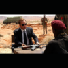 Photo du film Lord of War . On y vois le fusil AK47 factice dans les mains de l'acteur Nicolas Cage proposé à la vente par CineProps gamme Original