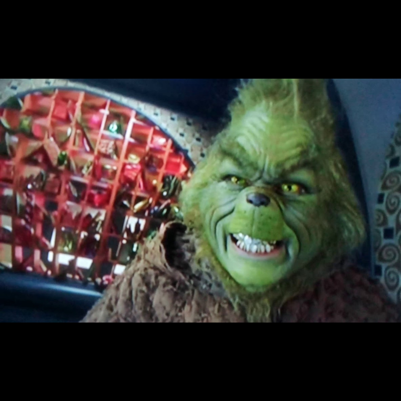 Photo 800 Grinch (1) image dans le film The Grinch avec le héro du produit Enveloppe du film The Grinch. Objet de collection. Props de cinéma.